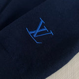 Front view of Louis Vuitton luxury clothing with contemporary cut