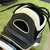 Gucci soft grey luxury sneakers view 4 premium leather build