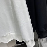 Side profile of Louis Vuitton luxury clothing with contemporary cut