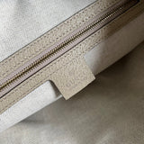 Side profile of classic chic women's handbag – women's designer-style accessory