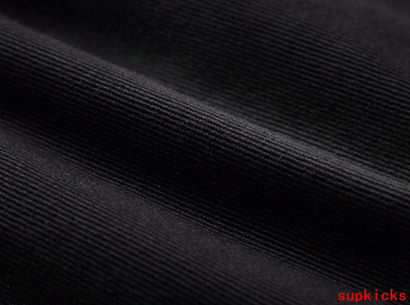 Back view of Rhude luxury clothing with everyday silhouette