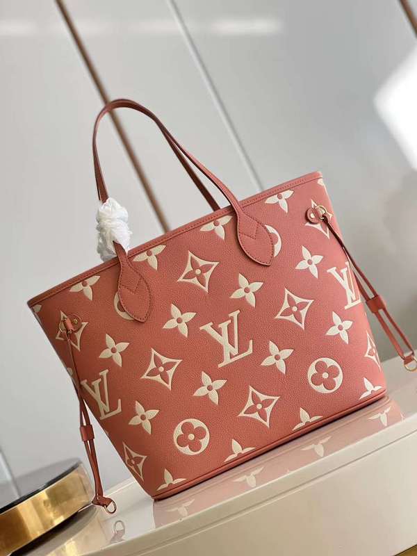 Side profile of statement signature women's handbag – women's luxury accessory