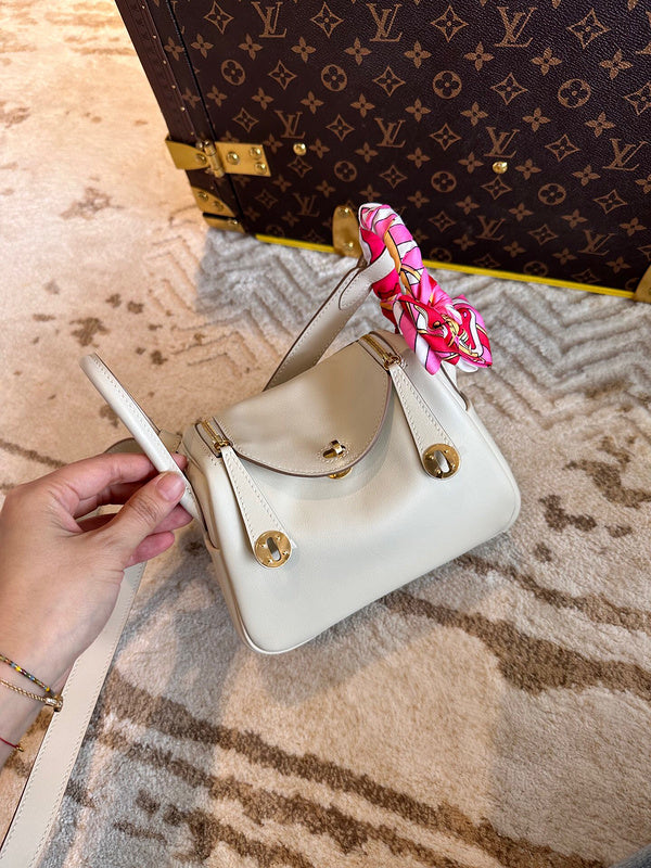 Side view of sleek structured handbag
