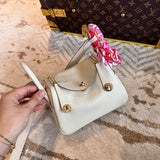 Side view of sleek structured handbag