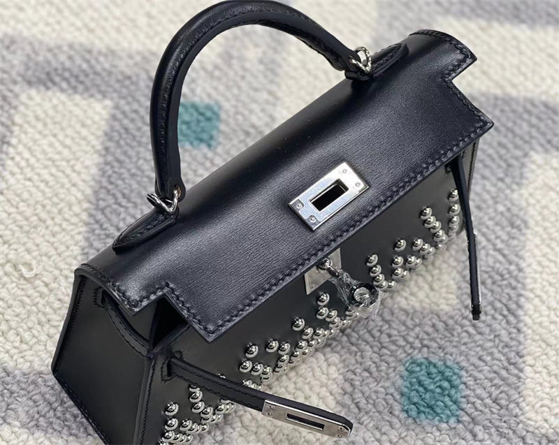  timeless top-handle bag detail view showing craftsmanship 8
