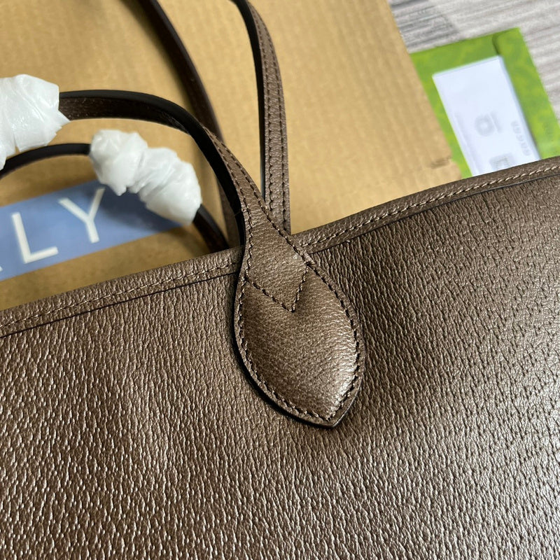 Back view of polished modern women's handbag – women's luxury accessory