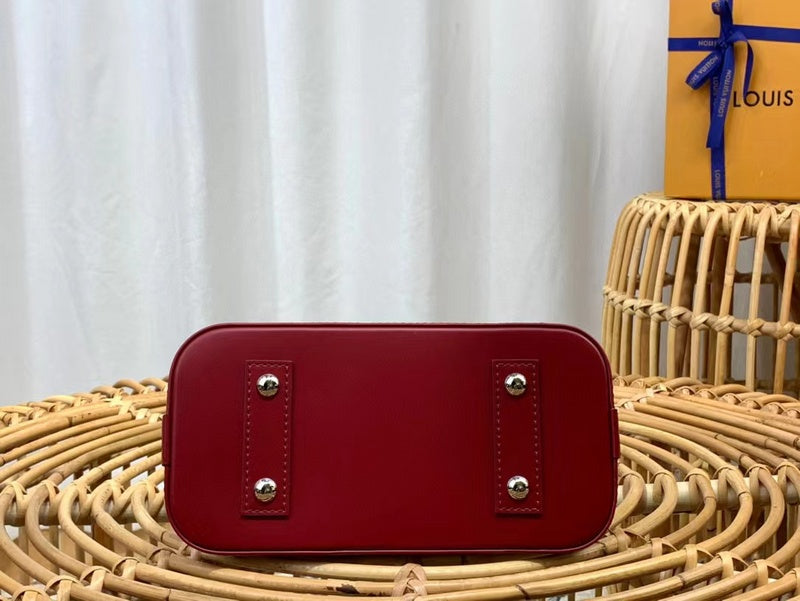 Styled lifestyle shot of polished classic women's handbag – women's statement bag