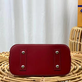 Styled lifestyle shot of polished classic women's handbag – women's statement bag