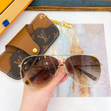 Side view of Louis Vuitton unisex sunglasses