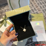 Lifestyle view of Van Cleef & Arpels unisex jewelry piece