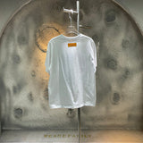 Side profile of Louis Vuitton cotton t-shirt with runway-inspired design