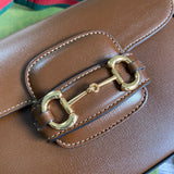 Side profile of premium classic women's handbag – women's statement bag
