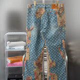 Side profile of Louis Vuitton luxury clothing with logo-detail design