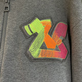 Full styled look of Louis Vuitton luxury clothing with label-forward styling