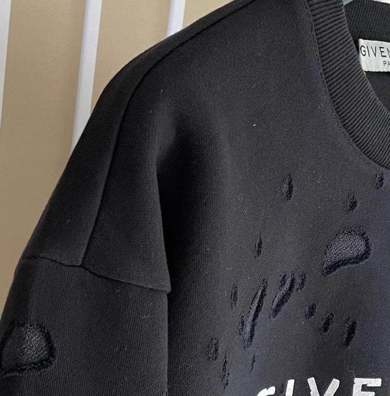 Full styled look of Givenchy luxury clothing with logo-detail design