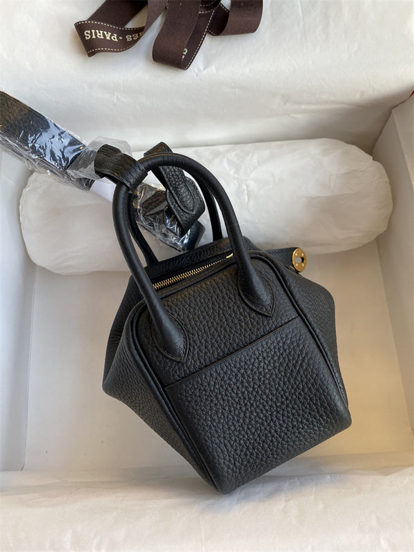Side view of polished structured handbag