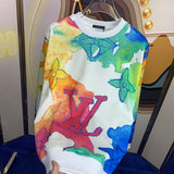 Close-up detail shot of Louis Vuitton luxury clothing with signature branding