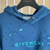Flat lay presentation of Givenchy luxury clothing with logo-detail design