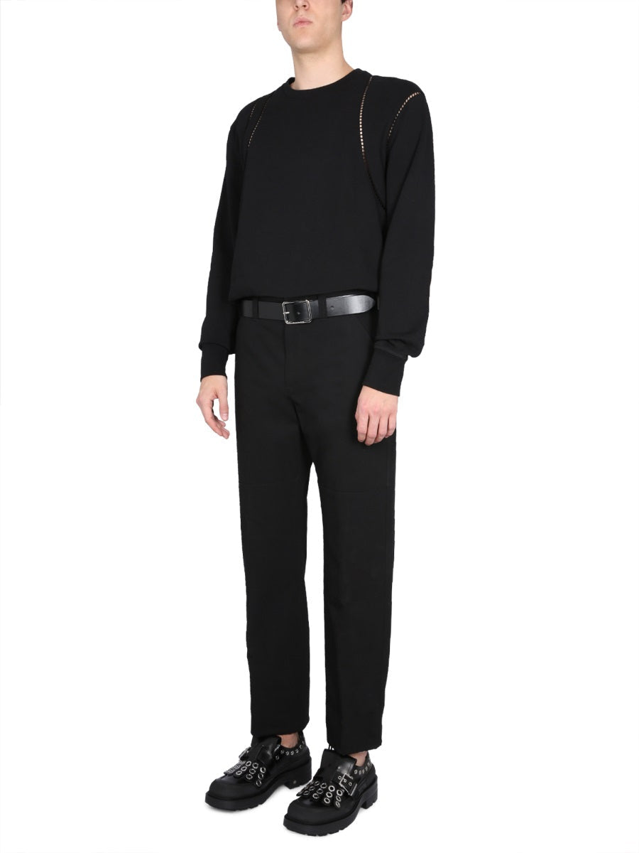 Alexander McQueen premium pants detail and craftsmanship close-up