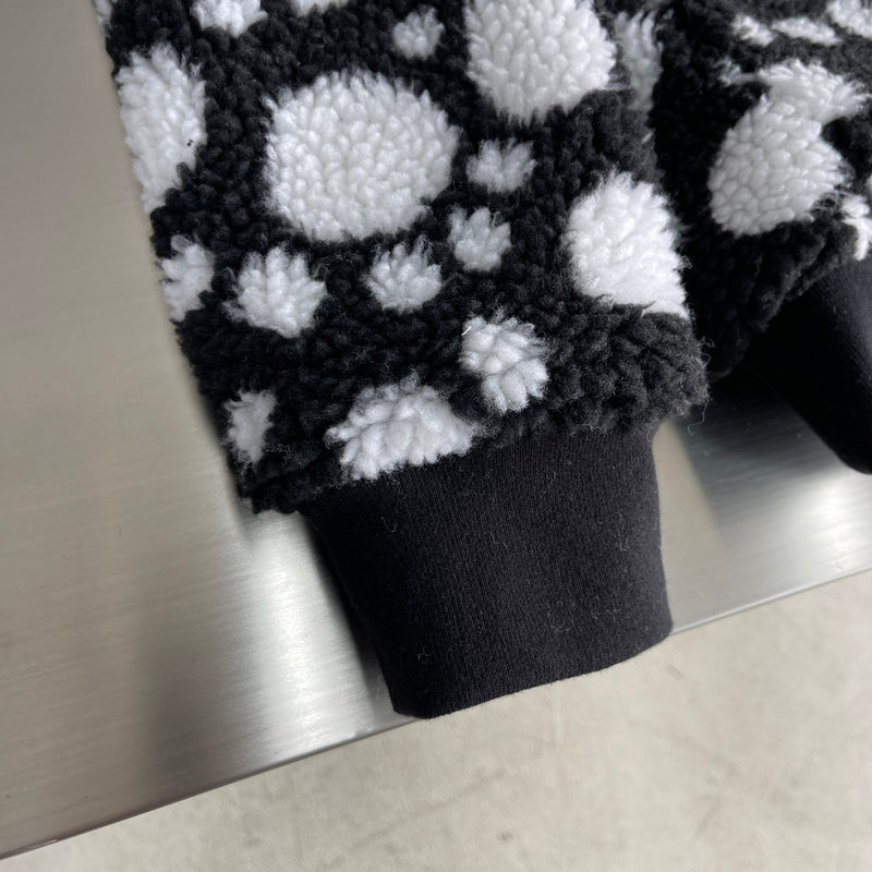 Front view of Louis Vuitton luxury clothing with everyday silhouette