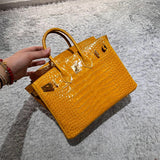  clean-lined crossbody bag styled with outfit