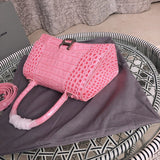 Back view of statement polished women's handbag – women's statement bag