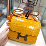 Side view of sleek structured handbag