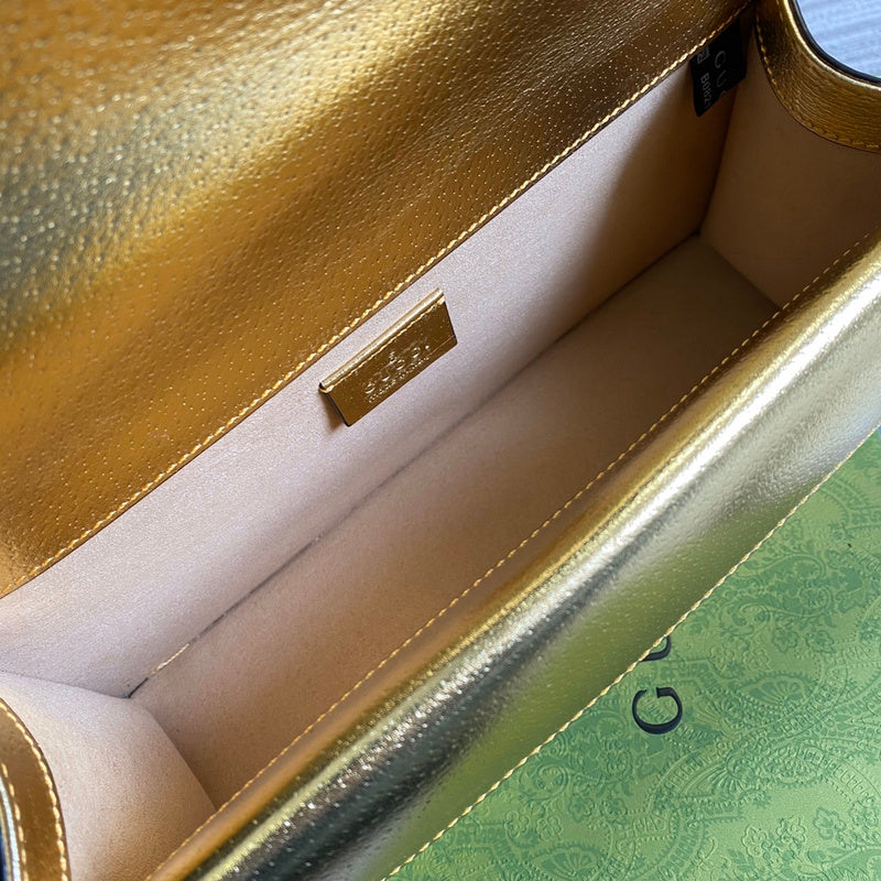 Handle and strap detail of statement polished women's handbag – women's luxury handbag