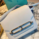 Side view of fluid structured handbag