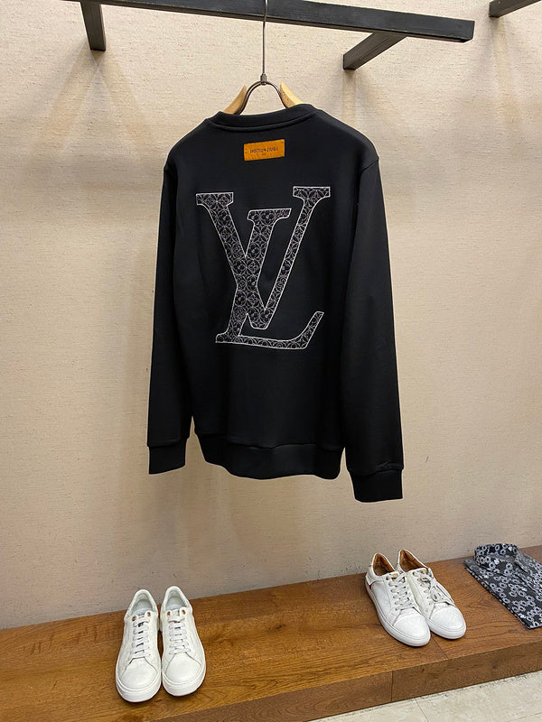 Side profile of Louis Vuitton luxury clothing with runway-inspired design