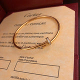 Front view of Cartier unisex jewelry piece