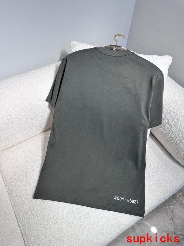 Front view of Moncler luxury clothing with signature branding