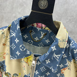 Close-up detail shot of Louis Vuitton luxury clothing with label-forward styling