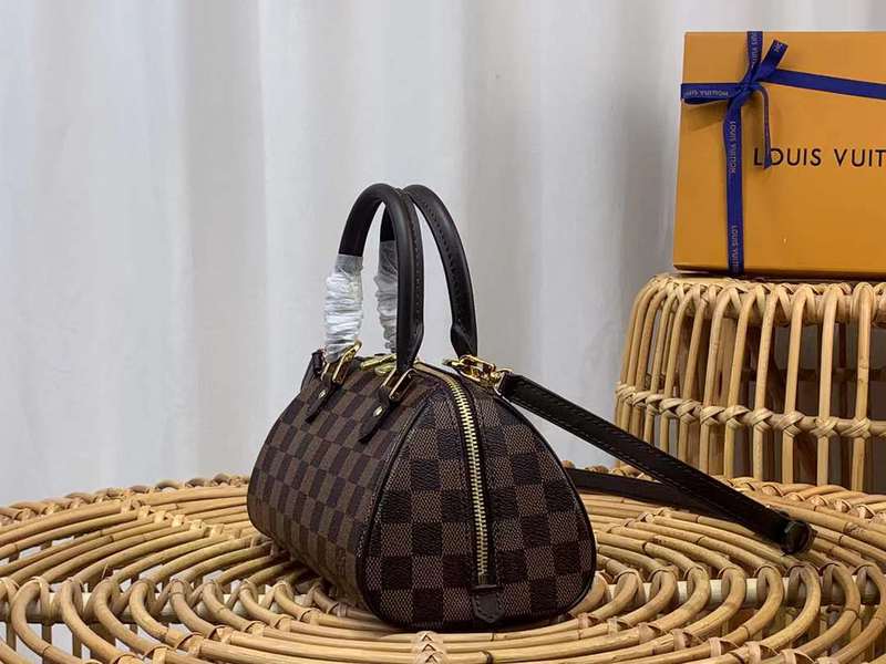 Close-up detail of elevated polished women's handbag – women's luxury accessory