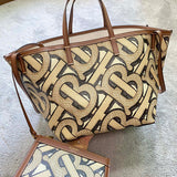 Ziva's Charm handbag – side angle view (one versatile size)