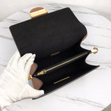 Back view of modern signature women's handbag – women's designer-style accessory