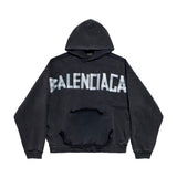 Close-up of Balenciaga jerseys & knitwear hardware and fine stitching