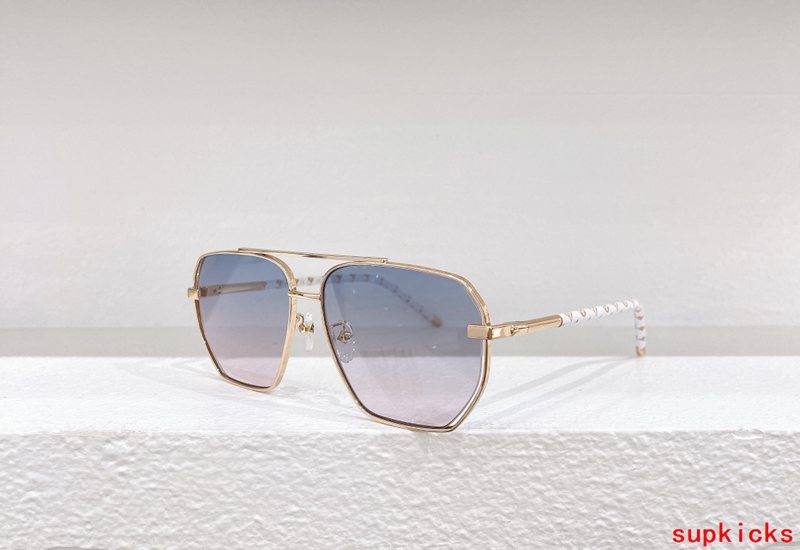 Close-up detail view of Louis Vuitton unisex sunglasses