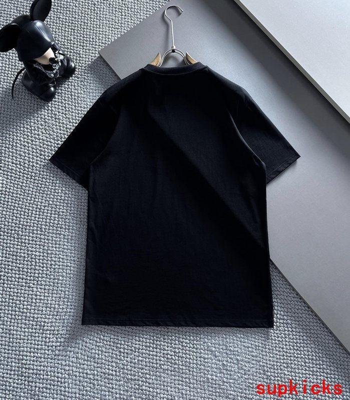 Close-up detail shot of Moncler luxury clothing with everyday silhouette