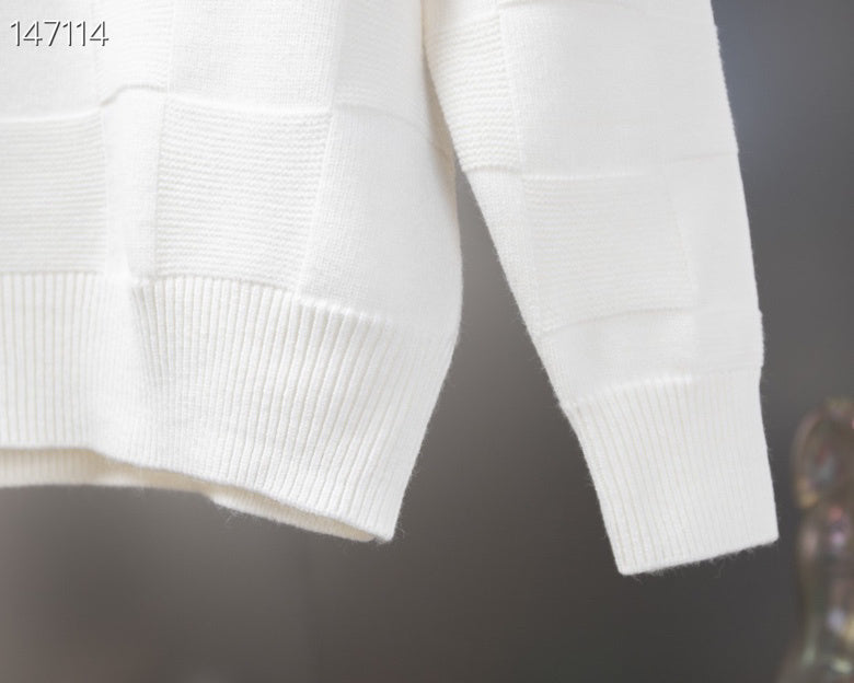 Flat lay presentation of Louis Vuitton luxury clothing with tailored silhouette