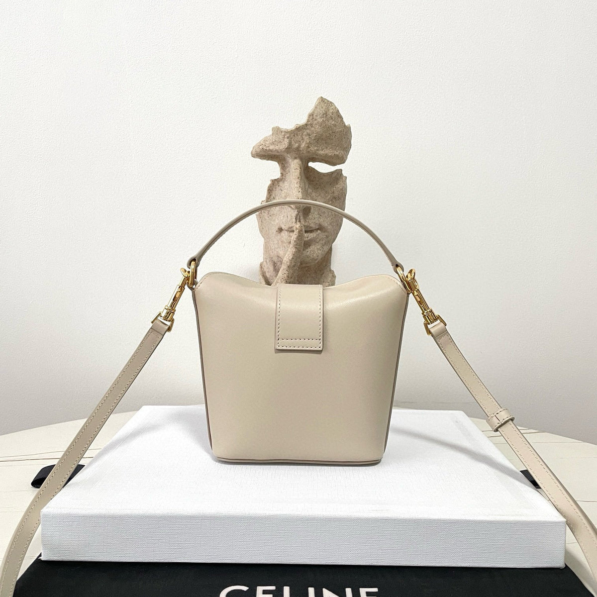 Side profile of Celine Fashion Item showcasing structured silhouette