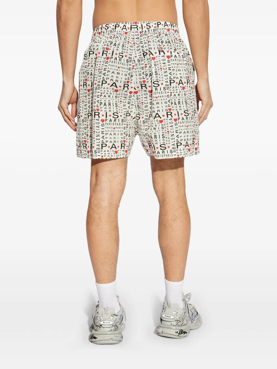 Close-up of Balenciaga pants hardware and fine stitching