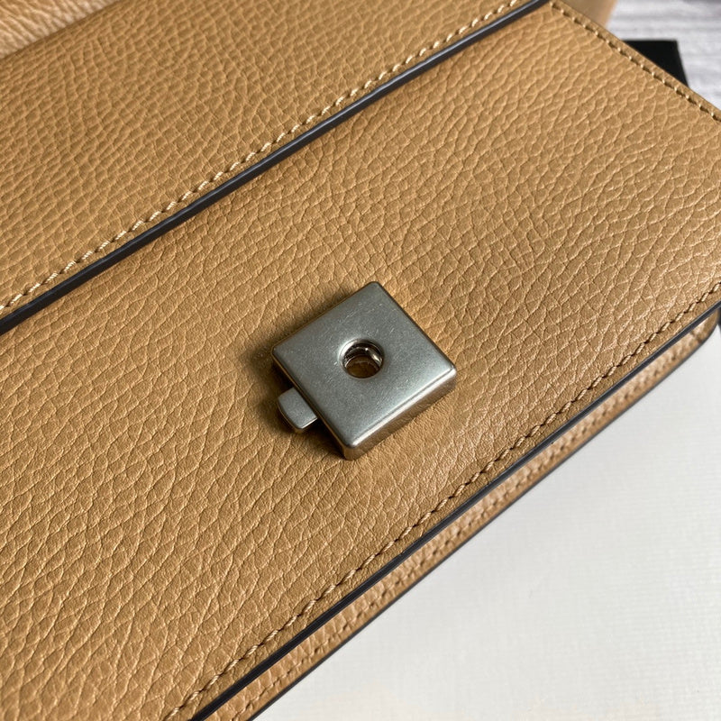Close-up detail of sleek polished women's handbag – women's statement bag
