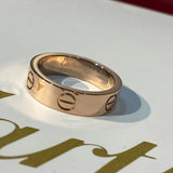 Side view of Cartier unisex jewelry piece