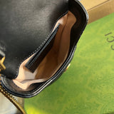 Side profile of elevated statement women's handbag – women's luxury accessory