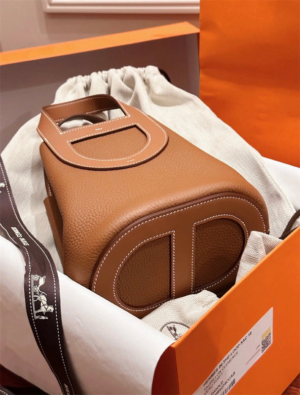 Side view of clean-lined structured handbag