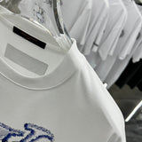 Full styled look of Louis Vuitton cotton t-shirt with monogram-inspired silhouette