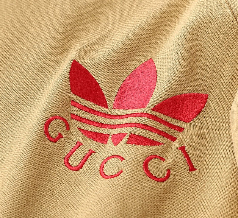 Front view of Gucci luxury clothing with signature branding