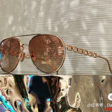 Front view of Louis Vuitton unisex sunglasses