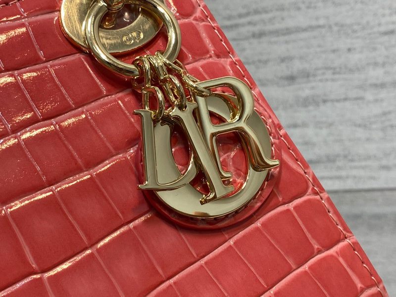 Styled lifestyle shot of statement sleek women's handbag – women's luxury handbag